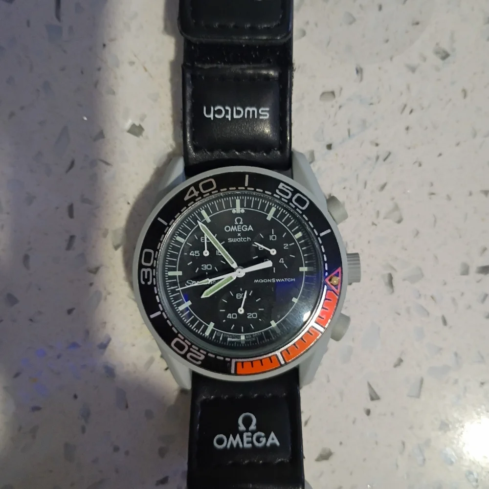 Omega Black Swatch Chronograph Watch with Orange Bezel Accent - Picture 1 of 2